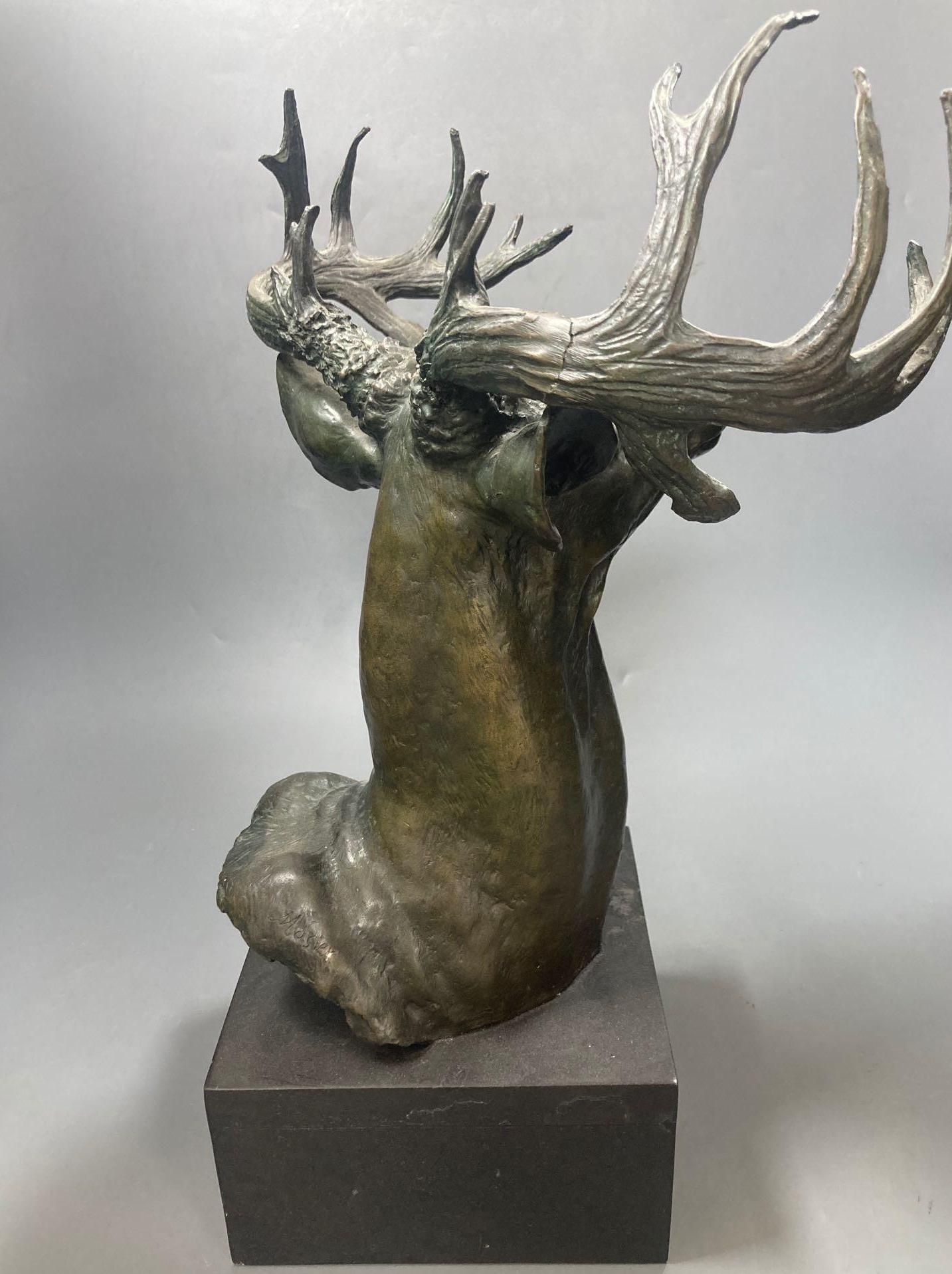 A bronze model of a stags head, 45cm including plinth